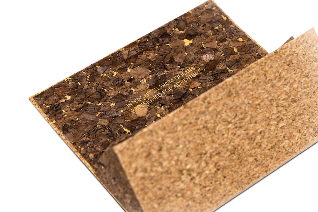 Cork glasses case with 'INTERCEPTED FROM OCEANS REDESIGNS FOR ADVENTURE' branding on a white background